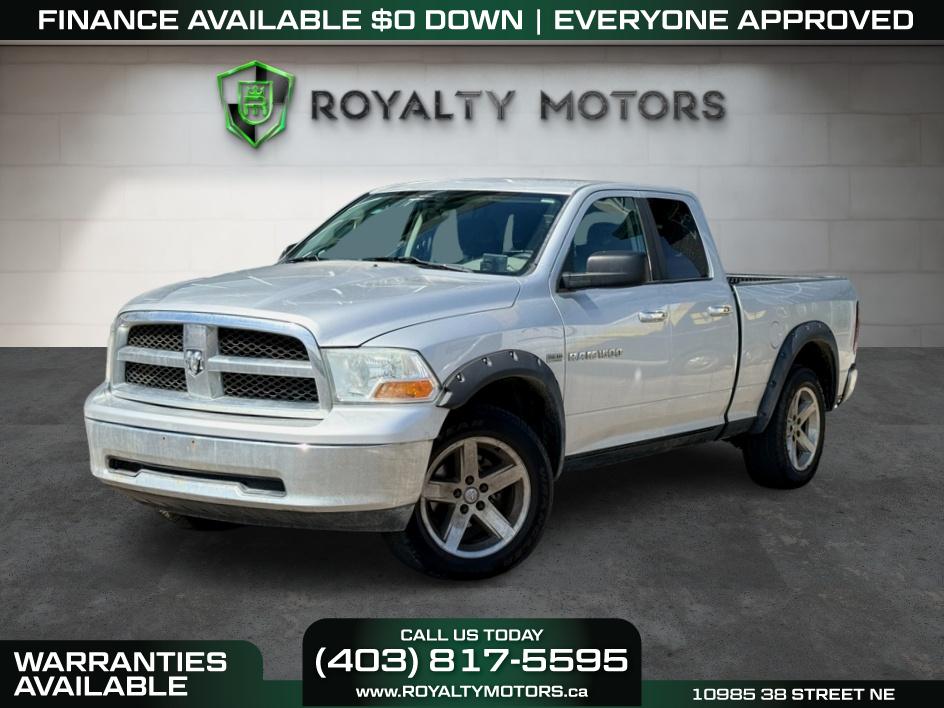 Silver 2012 RAM 1500 SLT Quad Cab 4WD Pickup Truck Four-Wheel Drive Automatic