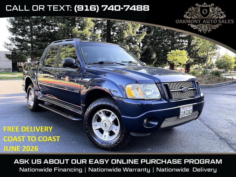 Blue 2004 Ford Explorer Sport Trac XLT 4WD Crew Cab Pickup Truck Four-Wheel Drive Automatic